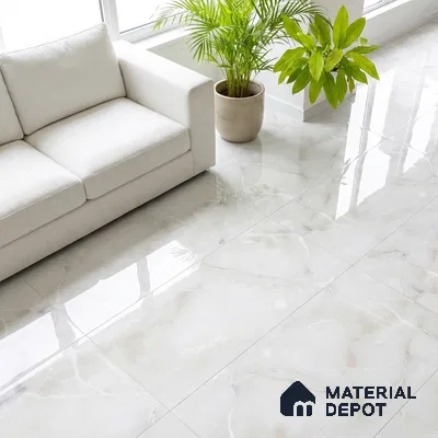 Minimalist living room with glossy white marble-look floor tiles and cream fabric sofa