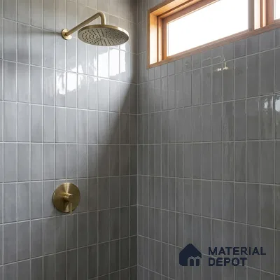 Modern Bathroom with Grey Glossy Stacked Tile and Brass Fixtures