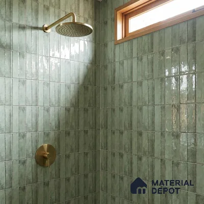 Modern Bathroom with Sage Green Glossy Stacked Tile and Brass Fixtures