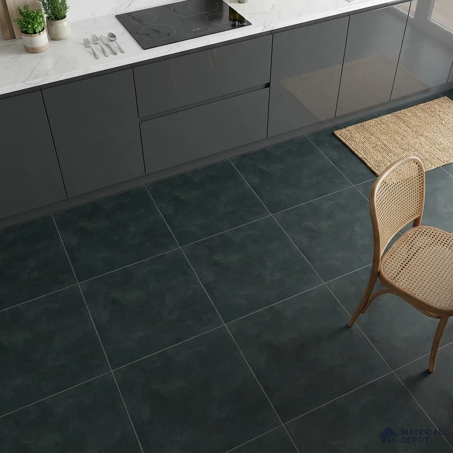 Modern kitchen with glossy grey laminate cabinets, white marble-look countertop, and dark slate floor tiles