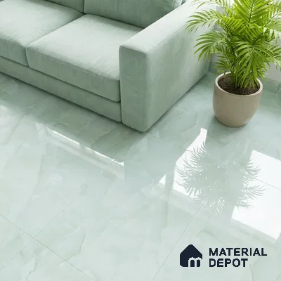 Minimalist living room with mint green marble-look floor tiles and pastel green fabric sofa