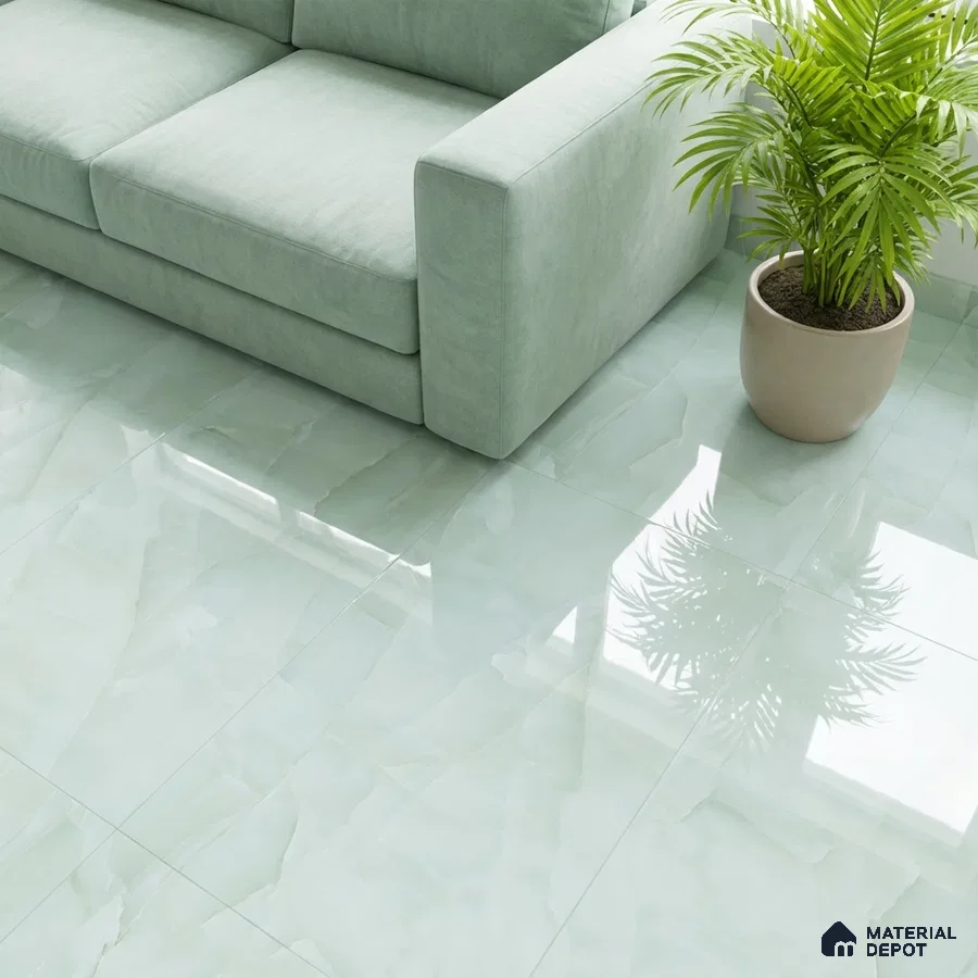 Minimalist living room with mint green marble-look floor tiles and pastel green fabric sofa