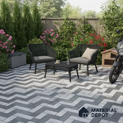 Modern outdoor patio with grey and white herringbone floor tiles and black wicker furniture