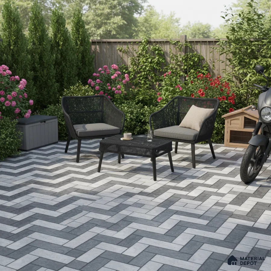 Modern outdoor patio with grey and white herringbone floor tiles and black wicker furniture
