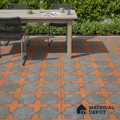 Mediterranean outdoor space with terracotta and grey geometric patterned floor tiles