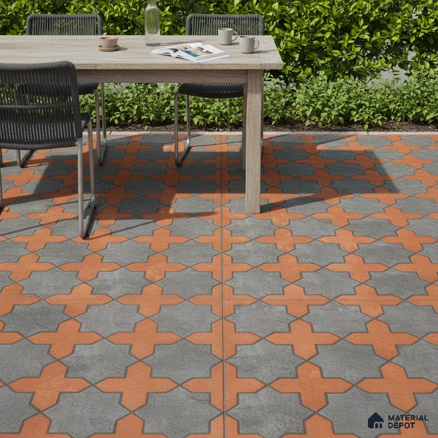 Mediterranean outdoor space with terracotta and grey geometric patterned floor tiles