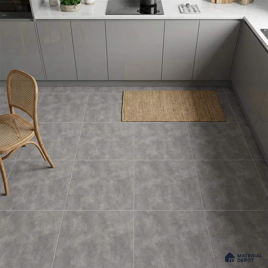 Modern kitchen with grey high gloss laminate cabinets and light grey stone-look floor tiles