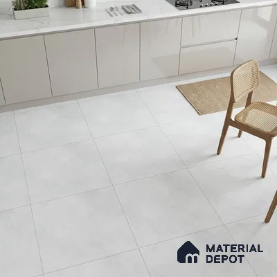 Minimalist kitchen with glossy beige laminate cabinets, white marble countertop, and matte white floor tiles