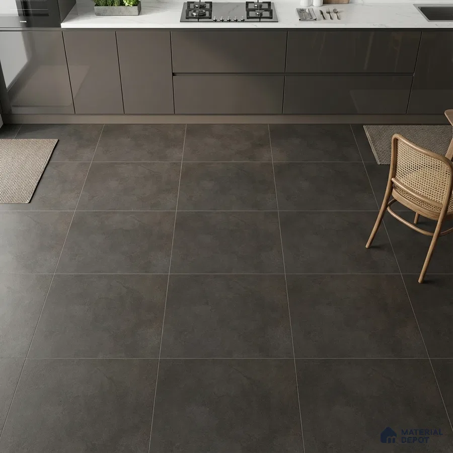 Modern kitchen with grey matte laminate cabinets and charcoal stone-look floor tiles