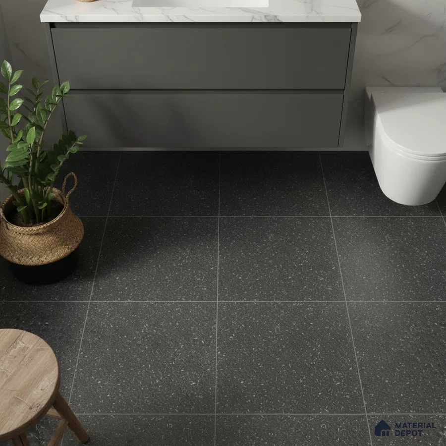 Modern bathroom with matte black terrazzo floor tiles and marble-look countertop
