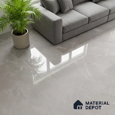 Modern living room with glossy light grey marble-look floor tiles and grey fabric sofa