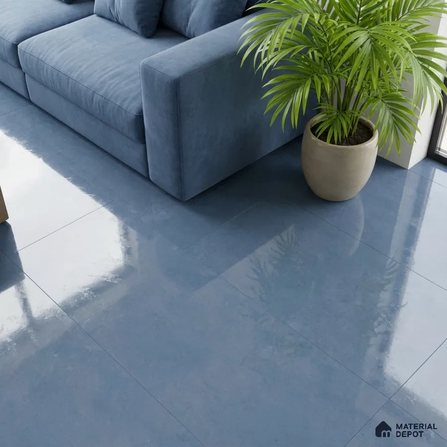 Modern living room with glossy blue floor tiles and blue fabric sofa