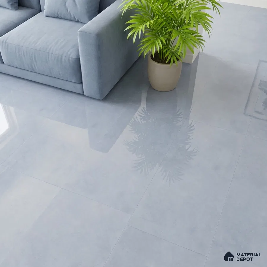 Minimalist living room with glossy pale grey floor tiles and pastel blue fabric sofa