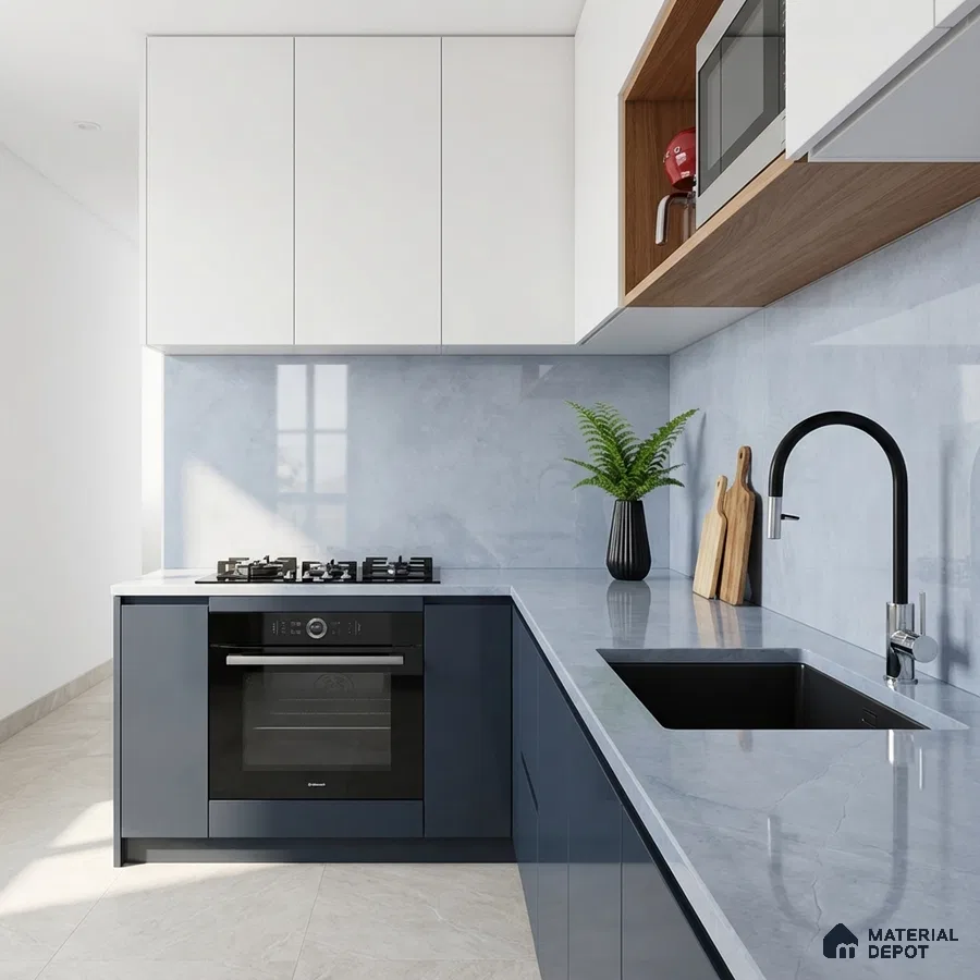 Modern kitchen with white and navy blue laminate, light grey marble-look quartz countertop, and backsplash