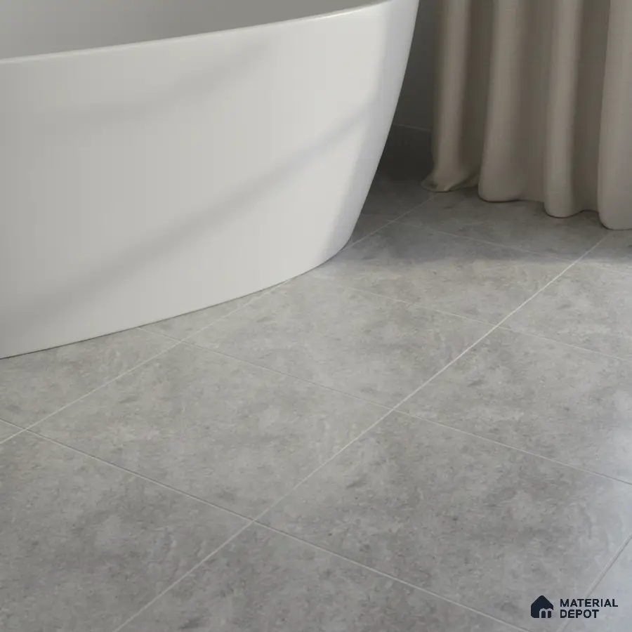 Minimalist bathroom with light grey stone-look floor tiles and freestanding tub