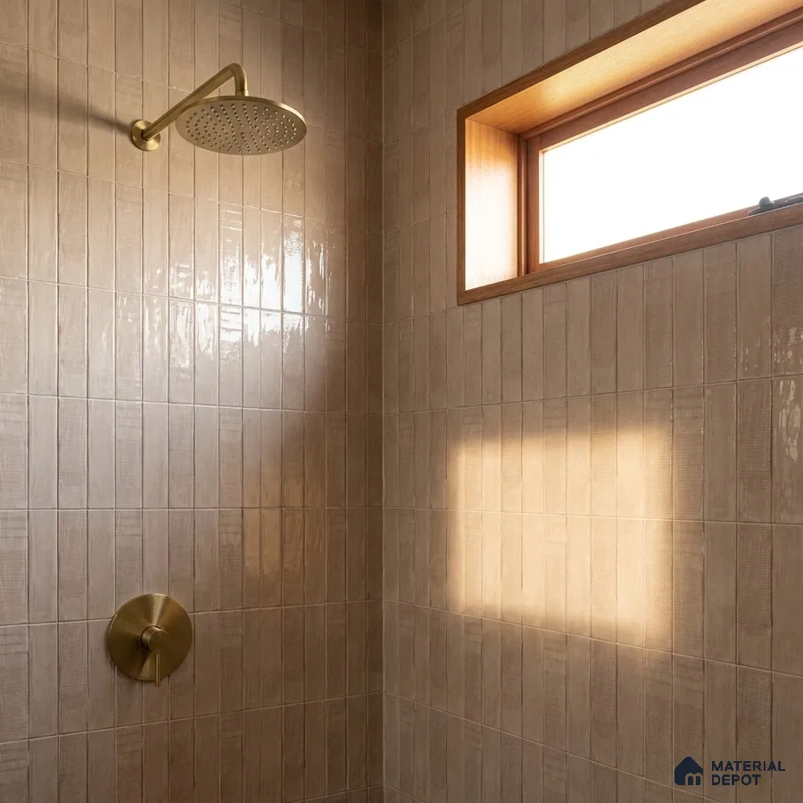 Modern Bathroom with Glossy Warm Taupe Vertical Subway Tile and Brass Fixtures
