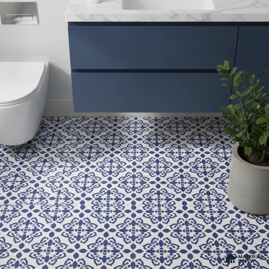 Modern bathroom with blue patterned floor tiles and navy blue vanity