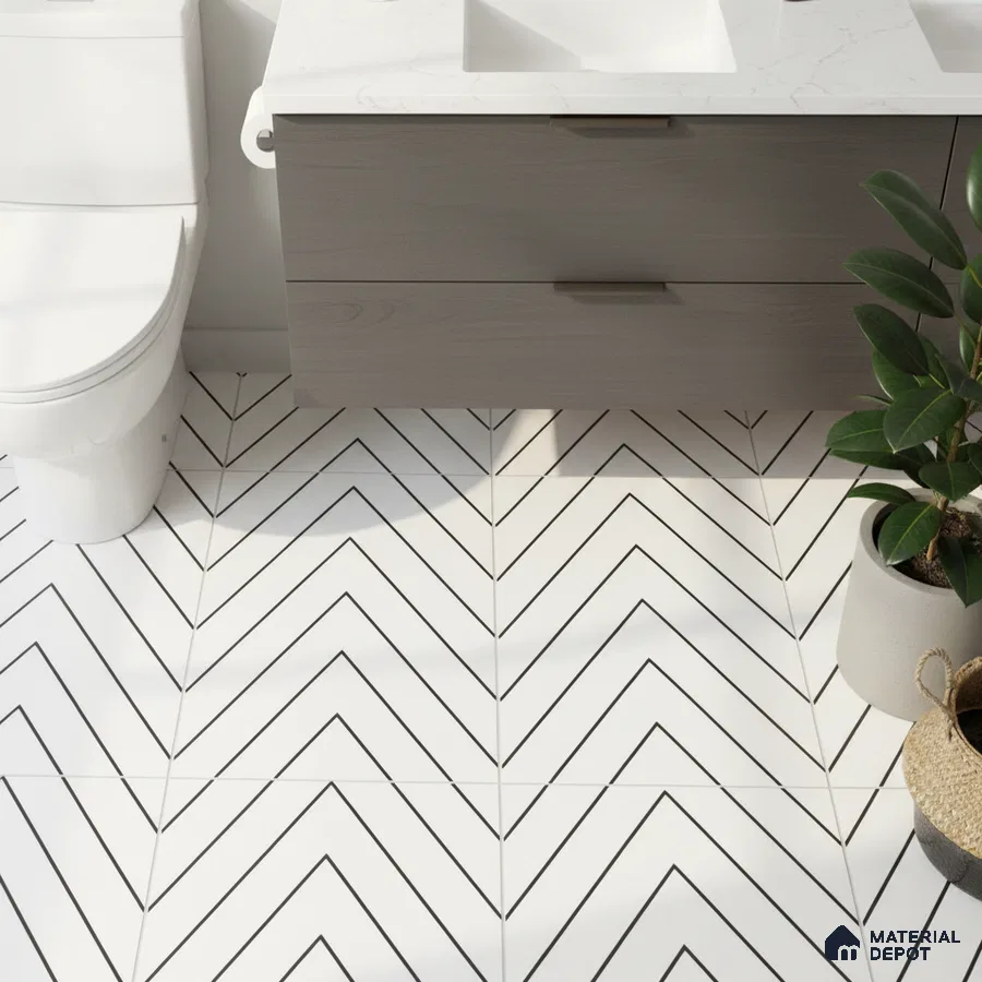 Modern bathroom with chevron patterned white floor tiles and grey wood vanity
