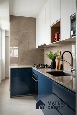Modern kitchen with glossy navy blue laminate, white laminate, and taupe marble-look backsplash