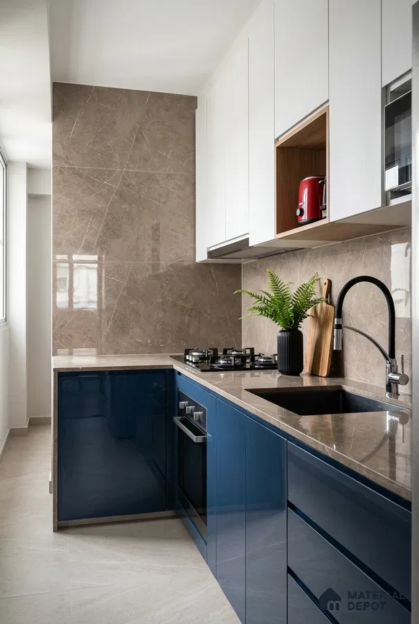 Modern kitchen with glossy navy blue laminate, white laminate, and taupe marble-look backsplash