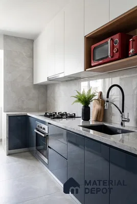 Modern kitchen with navy blue high gloss laminate, frosty white laminate, and grey marble-look backsplash tile