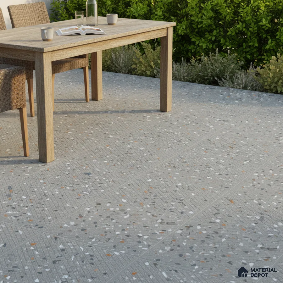 Modern outdoor space with grey terrazzo floor tiles and natural wood dining set