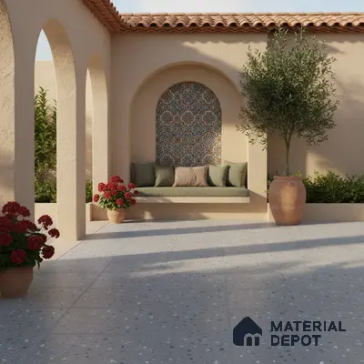 Mediterranean outdoor patio with patterned moroccan wall tile and terrazzo floor tile