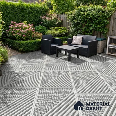 Modern outdoor patio with geometric patterned grey and white floor tiles