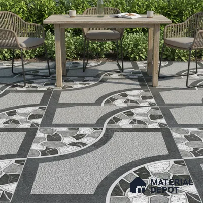 Modern outdoor space with geometric patterned grey and black floor tiles