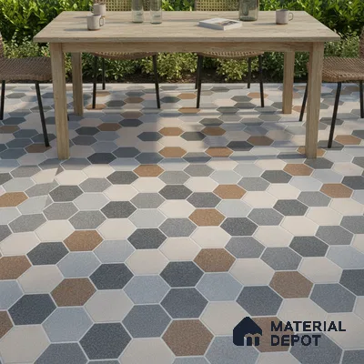 Modern outdoor space with multicolor hexagonal floor tiles and natural wood dining table