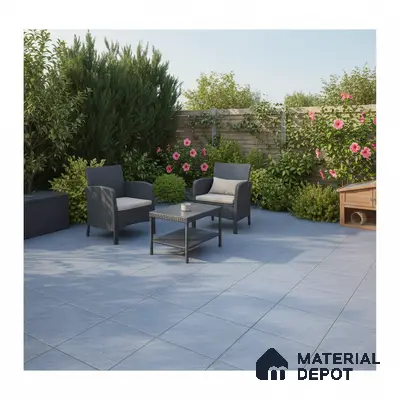 Modern outdoor patio with grey ceramic floor tiles and rattan furniture
