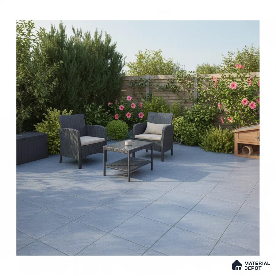 Modern outdoor patio with grey ceramic floor tiles and rattan furniture