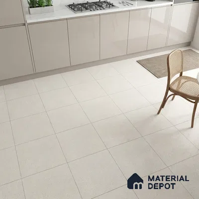 Modern kitchen with glossy beige laminate cabinets and white marble countertop