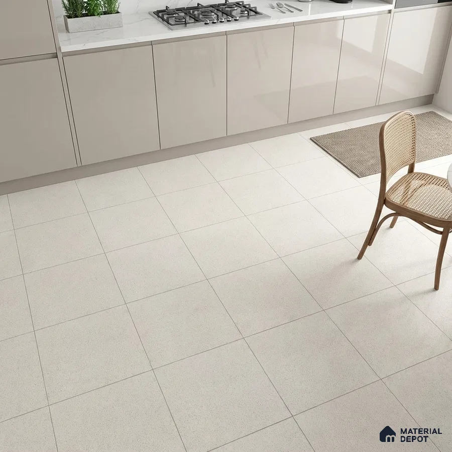 Modern kitchen with glossy beige laminate cabinets and white marble countertop