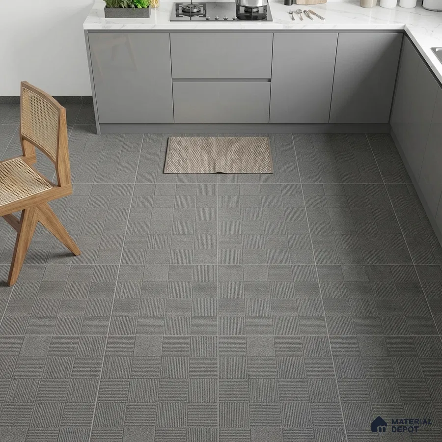Modern kitchen with grey matte laminate cabinets and geometric grey floor tiles