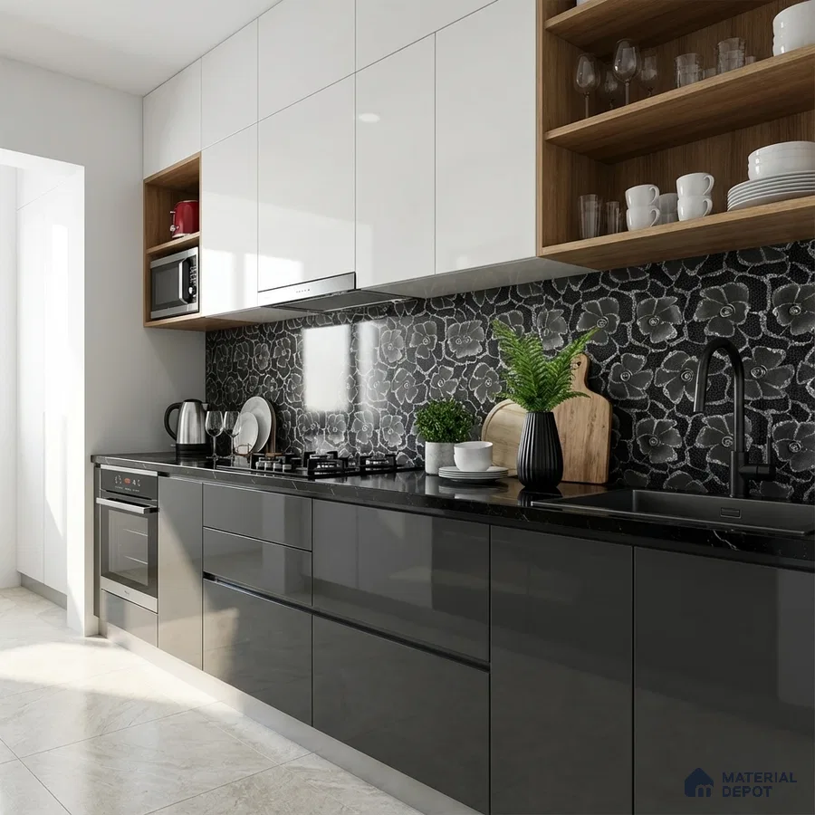Modern kitchen with glossy grey and white laminate, black floral backsplash tile, and black quartz countertop