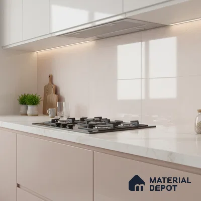 Minimalist kitchen with blush pink laminate, frosty white laminate, and white marble-look quartz countertop