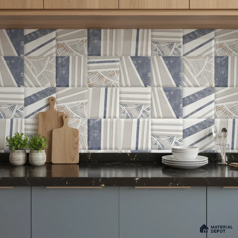 Modern kitchen with geometric blue and beige patterned backsplash tile, black marble countertop, and matte blue laminate cabinets