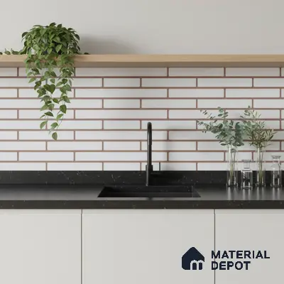 Minimalist kitchen with white brick subway tile backsplash and black marble countertop