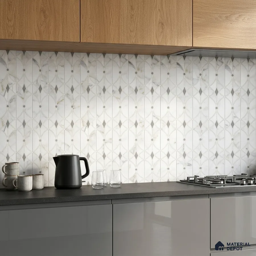 Modern kitchen with oak wood laminate cabinets, grey laminate base units, and geometric marble-look backsplash tiles