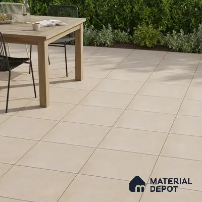 Minimalist outdoor patio with beige stone-look floor tiles and natural wood dining table
