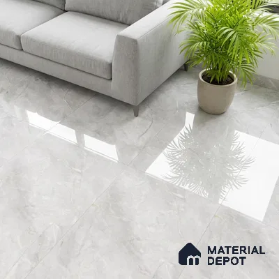 Minimalist living room with glossy light grey marble-look floor tiles and grey fabric sofa