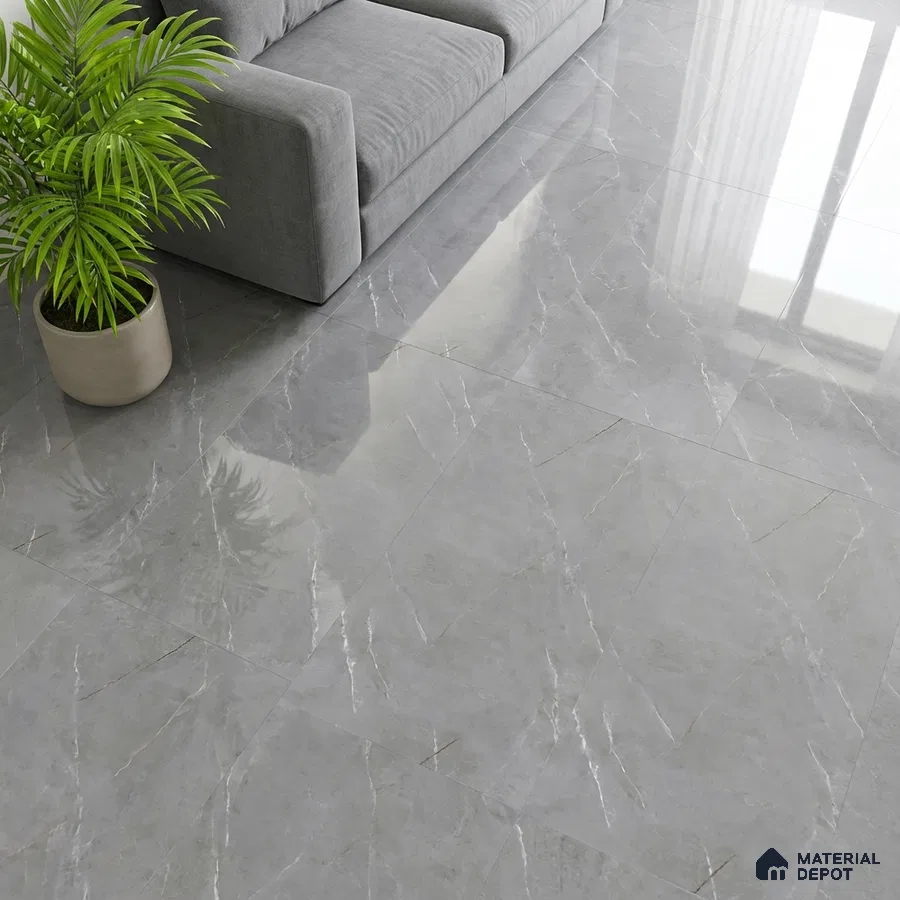 Modern living room with grey marble-look polished floor tiles and grey fabric sofa