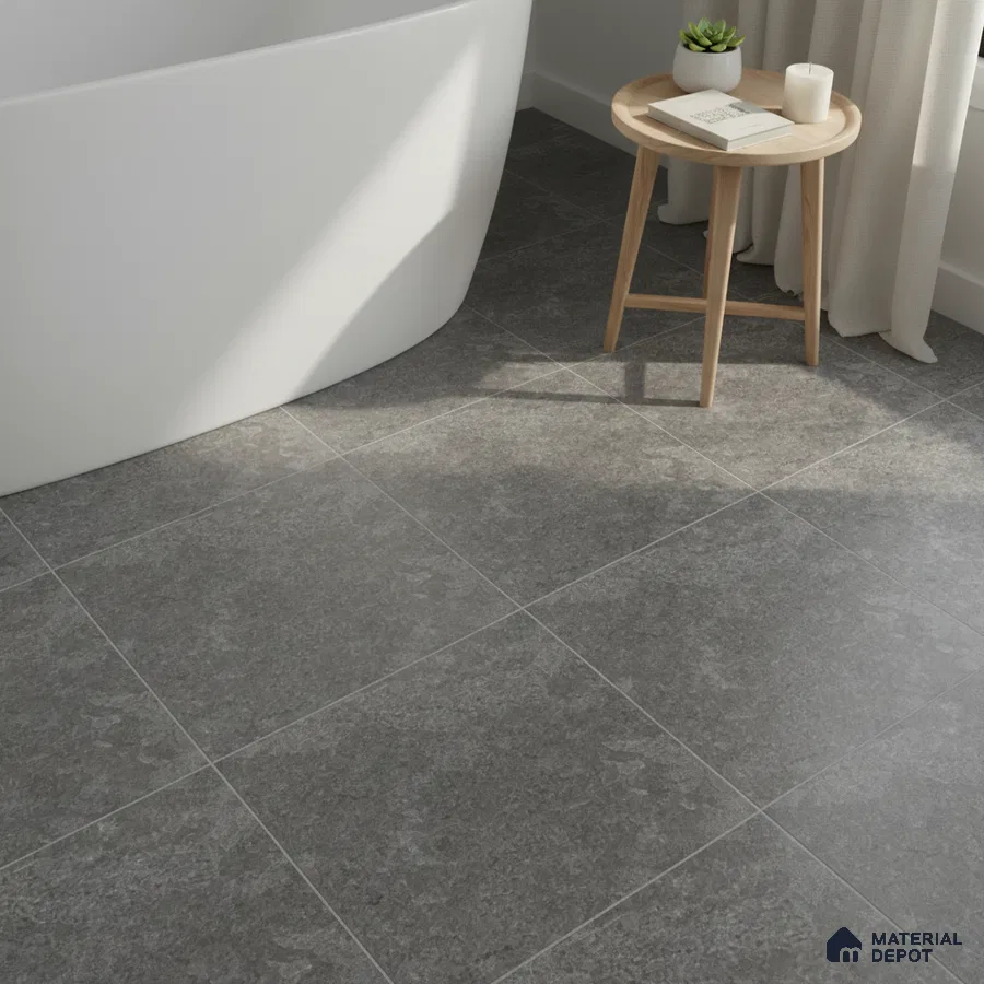 Minimalist bathroom with grey stone-look floor tiles and freestanding tub