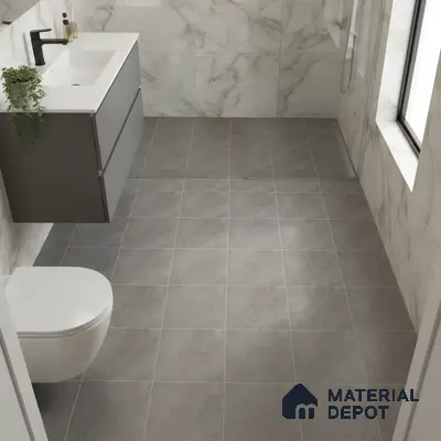 Modern bathroom with marble wall tiles, grey matte floor tiles, and floating vanity