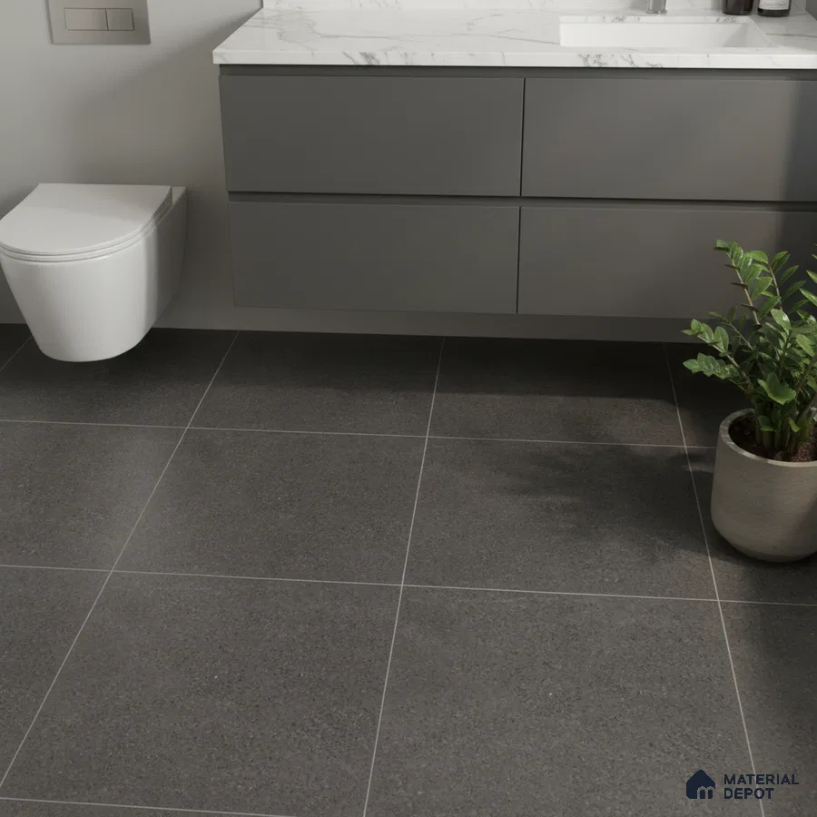 Minimalist bathroom with matte grey floor tiles and marble-look countertop vanity