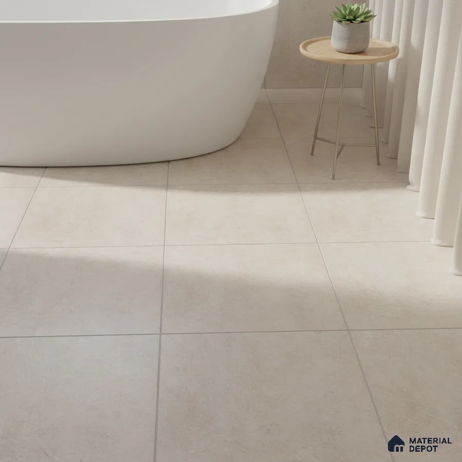Minimalist bathroom with matte beige floor tiles and freestanding tub