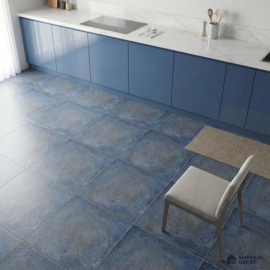 Modern kitchen with blue high gloss laminate cabinets, white marble-look countertop, and blue stone-look floor tiles