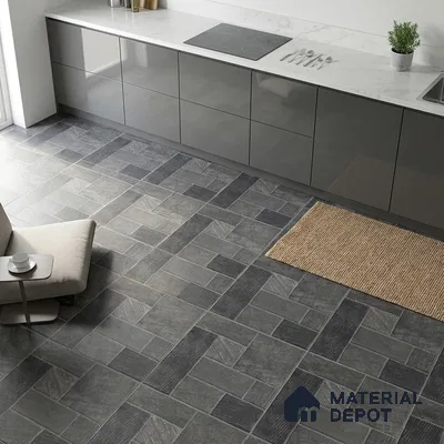 Modern kitchen with grey high gloss laminate cabinets, white marble countertop, and patterned grey stone floor tiles