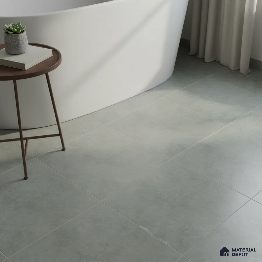 Minimalist bathroom with matte light grey floor tiles and freestanding tub